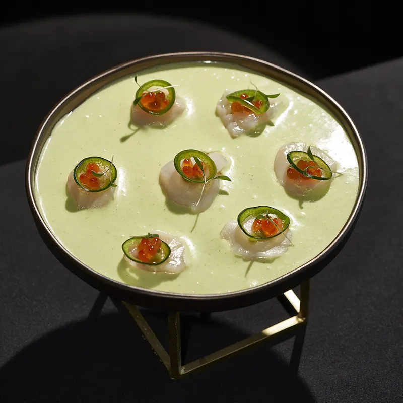 Scallop sashimi from Akai Brussels. Japanese-Mediterranean fusion rooftop restaurant.