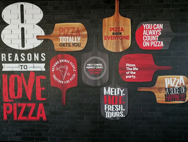 Pizza signage lot | Photo by Lip, on https://unsplash.com/@liplip?utm_source=centralapp&utm_medium=referral