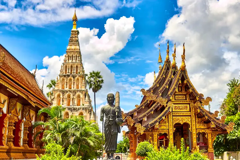 Image of Nuad Sabai Massages standing statue and temples landmark during daytime | Photo by Mathew Schwartz, on https://unsplash.com/@cadop?utm_source=centralapp&utm_medium=referral
