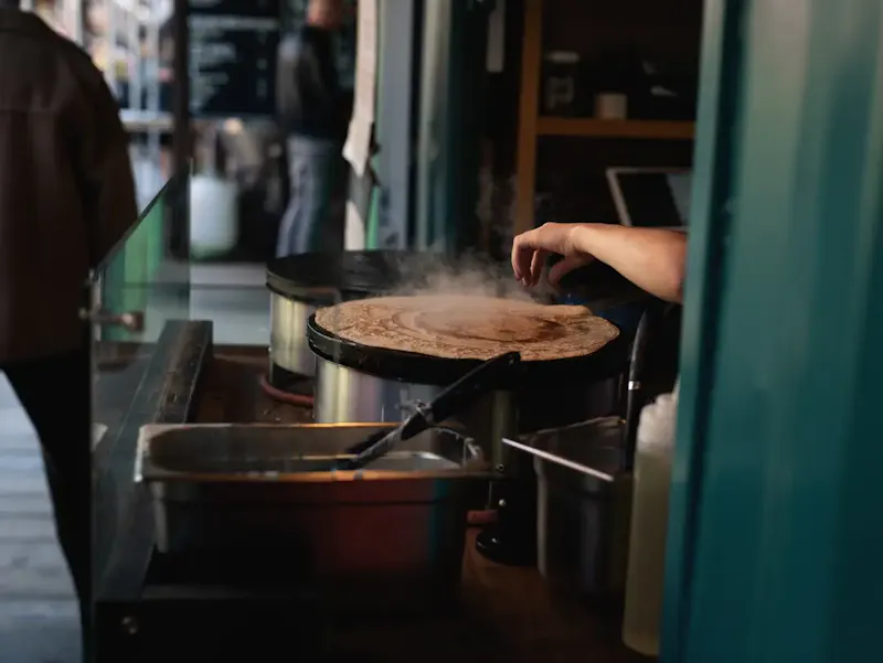 person cooking at steamer | Photo by Jason King, on https://unsplash.com/@jason_king_york?utm_source=centralapp&utm_medium=referral