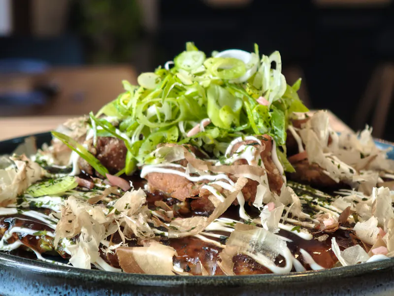 🍽️ OKONOMIYAKI — The “Japanese pizza” from Hiroshima and Osaka