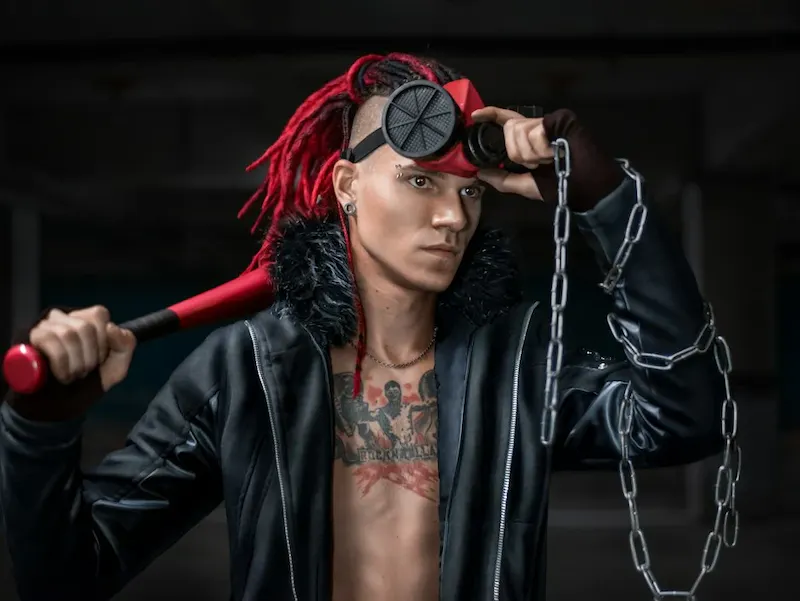 woman in black leather jacket holding black headphones | Photo by Some Tale, on https://unsplash.com/@some_tale?utm_source=centralapp&utm_medium=referral