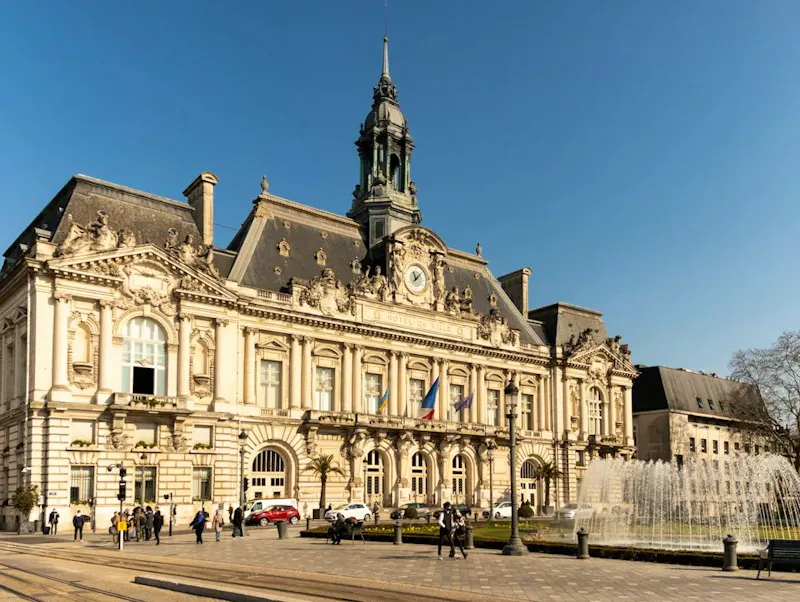 Image of Domaine des Acacias a large building with a clock tower | Photo by Jordi Vich Navarro, on https://unsplash.com/@jvich?utm_source=CentralApp&utm_medium=referral