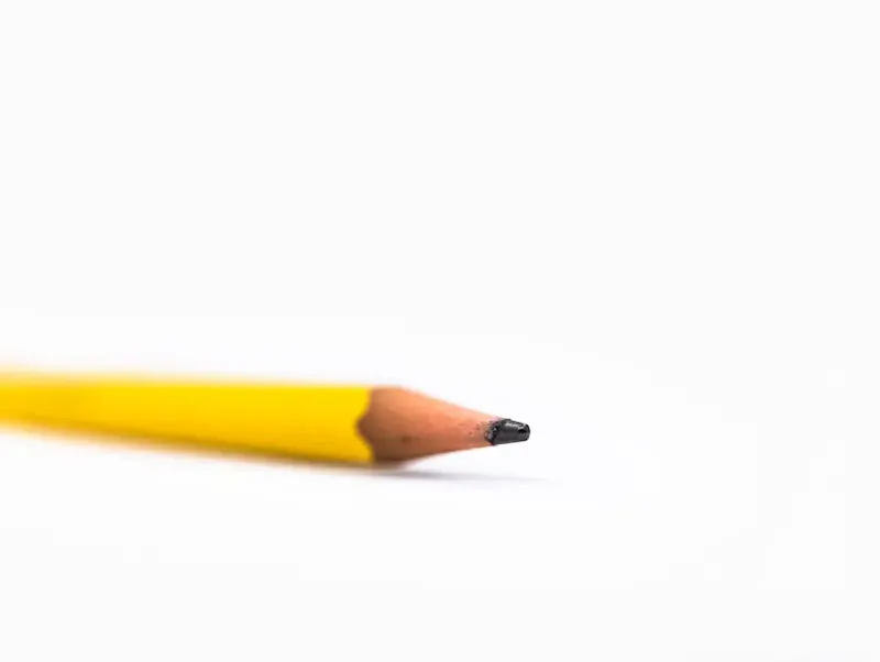 Image of Youpi Bugs yellow pencil on white surface | Photo by Solen Feyissa, on https://unsplash.com/@solenfeyissa?utm_source=centralapp&utm_medium=referral